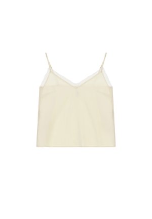 Top smanicato color crema con spalline sottili e rifinitura in pizzo lungo la scollatura e i lati, mostrato su sfondo bianco.