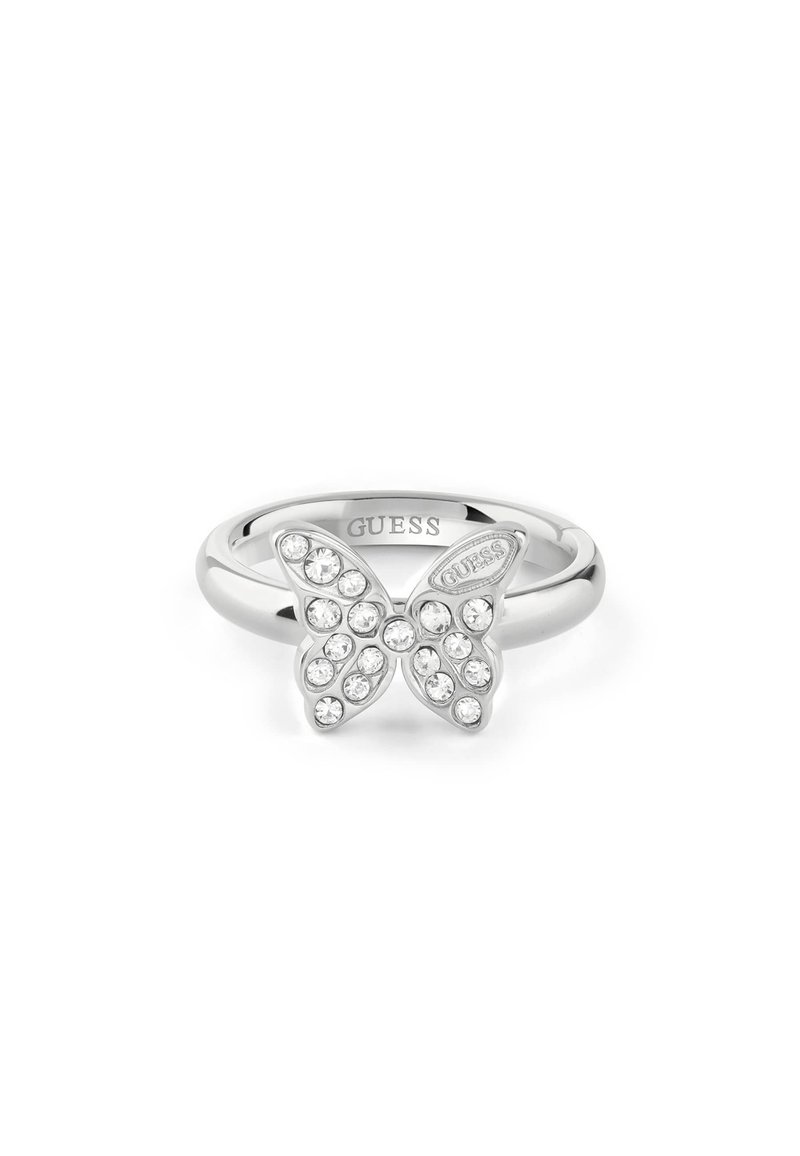 Anello a forma di farfalla argentato con dettagli in strass trasparente e una banda lucida. Logo "GUESS" inciso all'interno della banda.