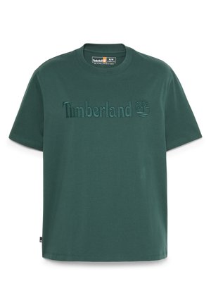 Grünes Timberland T-Shirt mit kurzen Ärmeln und gesticktem Logo sowie Baumemblem auf der Brust, Größe M, Rundhalsausschnitt.