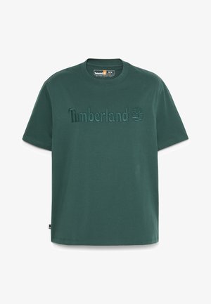 Grøn Timberland T-shirt med kortærmer, broderet logo og træsymbol på brystet, størrelse medium, rund hals.