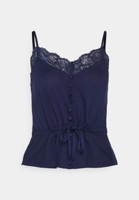 Navyblauwe camisole met kanten rand, verstelbare bandjes en knoopsluiting aan de voorkant. Heeft een gecinchde taille en een uitlopende onderkant. Zachte stoftextuur.