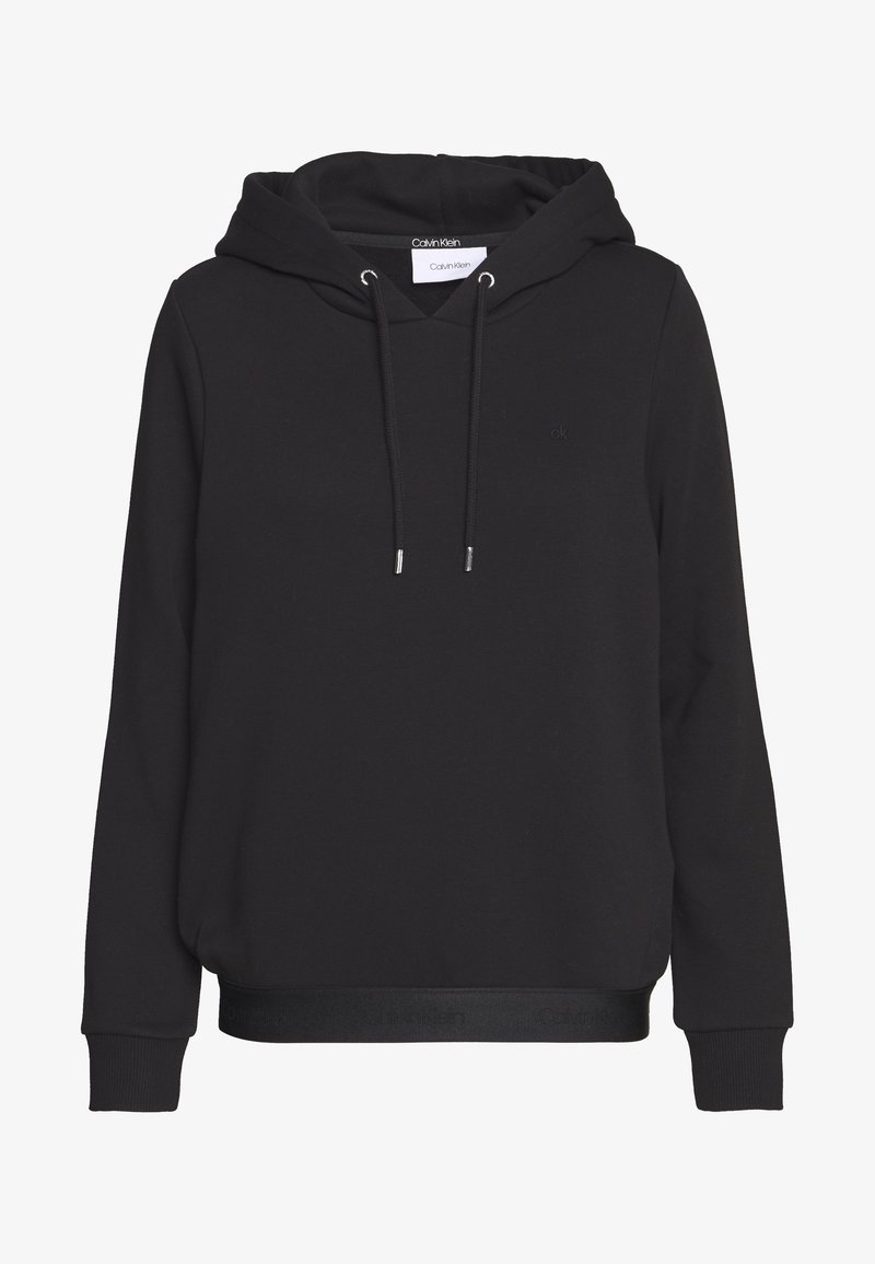 Sweat à capuche noir à manches longues avec cordons, poignets côtelés et logo Calvin Klein sur la poitrine et à l’intérieur du col.