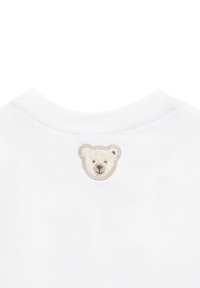 T-shirt bianco in cotone con scollatura rotonda, caratterizzato da un patch ricamato con un volto di orso polare testurizzato sulla parte posteriore.