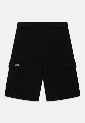 Shorts cargo noirs en coton, dotés de deux poches latérales avec fermetures à rabat, d'une taille élastique et de détails de couture sur l'ourlet.