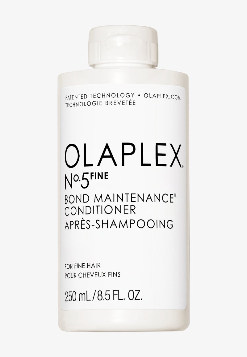 Vit plastflaska med skruvkork. Svart text inkluderar "OLAPLEX No.5 Fine Bond Maintenance Conditioner" och produktinformation. 250 mL.