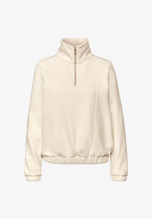 Jasnobeżowy polarowy pulower z wysokim kołnierzem, zamkiem na pół długości i elastycznym obszyciem na dole oraz przy mankietach. Posiada subtelne przeszycia na panelach.