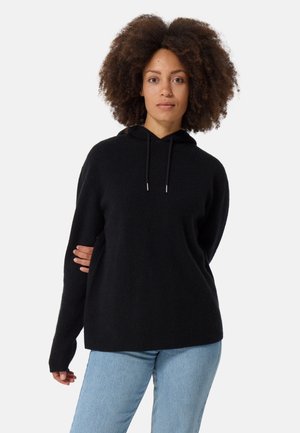 Sweat à capuche noir avec une texture côtelée, manches longues et coupe décontractée. Doté de cordons de serrage au niveau du cou et d'un ourlet droit.