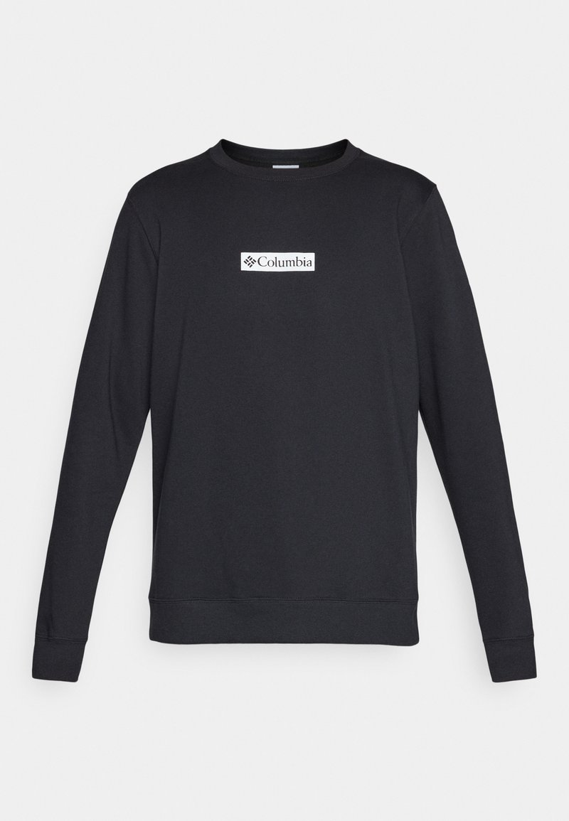 Sweat-shirt noir à manches longues en tissu mélange coton. Présente un logo Columbia blanc brodé sur la poitrine. Encolure ras du cou avec des poignets côtelés.