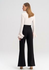 Touché Privé SLIT DETAILED - Hlače - black