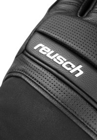 Guanto in pelle nera con texture perforata, dotato di una sezione imbottita e del logo bianco "reusch" sul retro. Fodera interna morbida visibile.