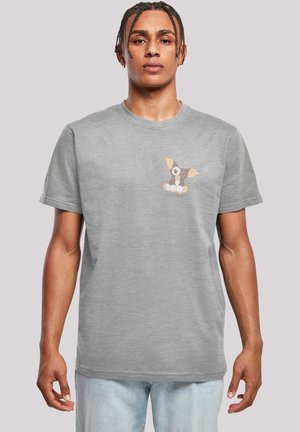 Gray short-sleeve t-shirt made of cotton, featuring a cartoon dog graphic on the left chest area. Simple round neckline and relaxed fit.