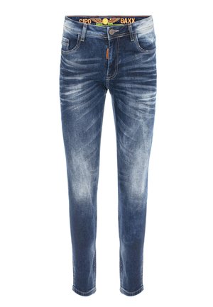 Blaue Denim-Jeans mit schmalem Schnitt, verwaschenen Details und einer leicht beschädigten Textur. Verfügt über fünf Taschen und einen Knopfverschluss.