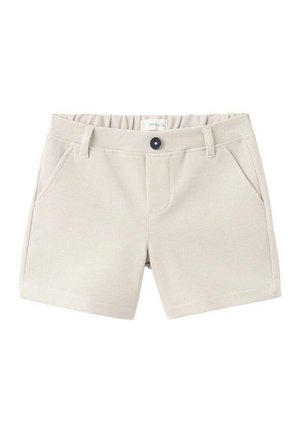 Svetlobéžové šortky s elastickým pásom, pútkami na opasok, dvoma prednými vreckami a čiernym gombíkom uprostred prednej časti.