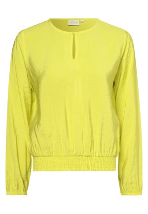 Blouse jaune à manches longues avec encolure ronde, fermeture à bouton en trou de serrure, ourlet et poignets élastiqués, en tissu lisse et brillant.