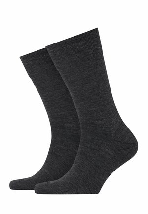 Dunkelgraue Socken aus einem glatten, gestrickten Stoff mit einer Länge bis zur Mitte der Wade und verstärktem Zehenbereich. Einfaches Design ohne Muster.