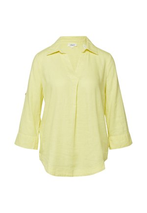 Jasnożółta bluzka z długim rękawem, kołnierzem w kształcie litery V i luźnym krojem, wykonana z lekkiego materiału, przedstawiona na białym tle.