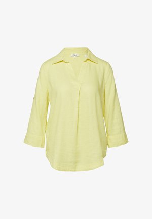 Jasnożółta bluzka z długim rękawem, kołnierzem w kształcie litery V i luźnym krojem, wykonana z lekkiego materiału, przedstawiona na białym tle.