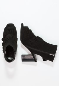 River Island Varrelliset sandaalit - black