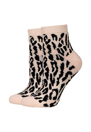 Paar knöchellange beige Socken mit unregelmäßigem schwarzem Leopardenmuster.