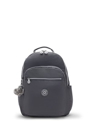 Black Kipling backpack with front zipper pocket, side pockets, top handle, and a small plush monkey keychain attached.