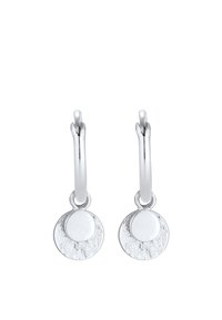 Orecchini a cerchio in argento con pendenti rotondi texture. I pendenti presentano un dettaglio circolare lucido al centro.