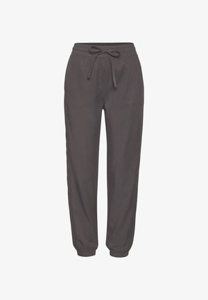 Pantalones jogger de color gris oscuro en tejido ligero. Cuentan con una cinturilla elástica con un lazo delantero y puños ajustados en los tobillos.