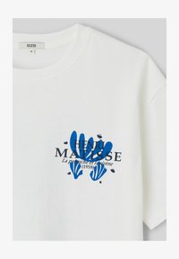 Sélectionné, blanc écru