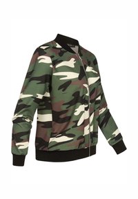 Camo Bomberjacke in verschiedenen Grüntönen, Brauntönen und Weiß. Hergestellt aus weichem, dehnbarem Stoff mit Reißverschluss und gerippten Manschetten und Saum.