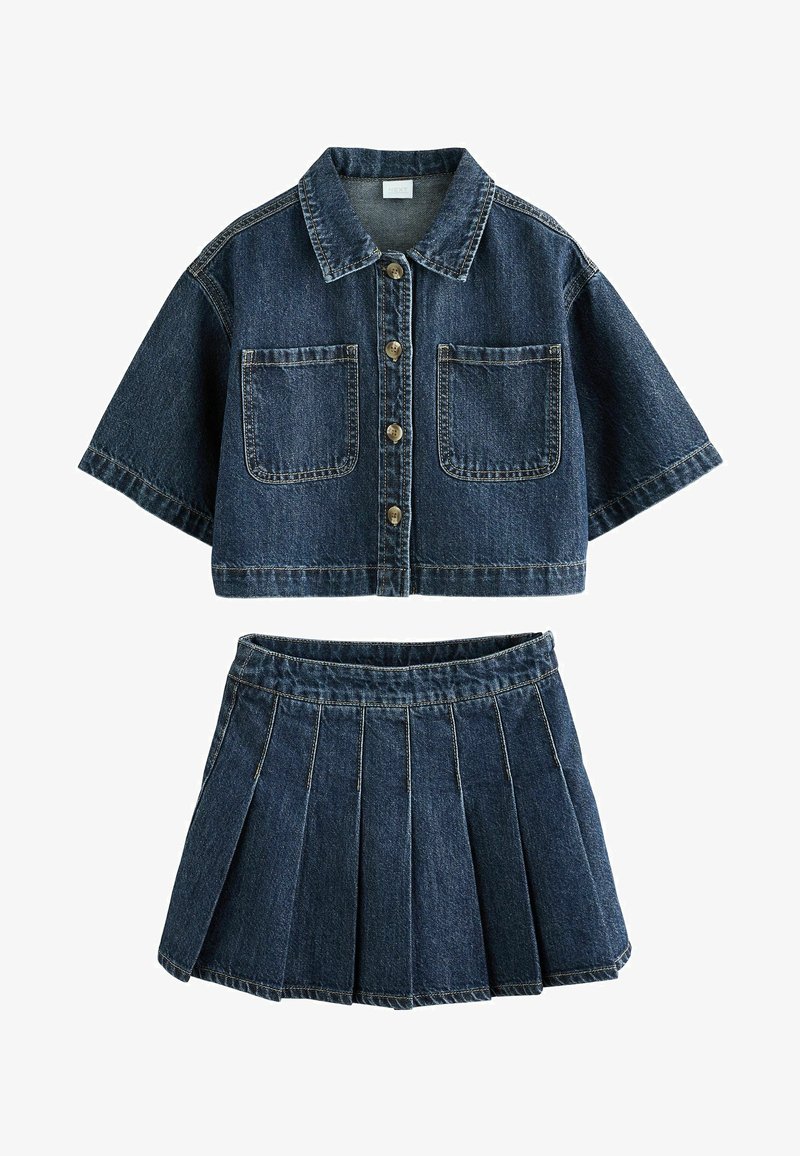 Dark blue denim short-sleeve button-up cropped jacket with chest pockets and matching pleated mini skirt.