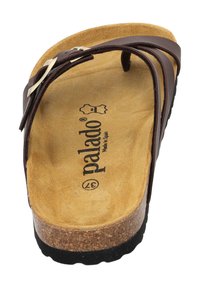 Brown leather sandal with a textured, cork footbed and a black rubber sole. Features two straps and an adjustable metal buckle.