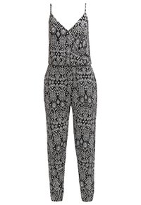 Combinaison noire et blanche sans manches avec de fines bretelles et des motifs géométriques en forme de losanges sur toute la surface.