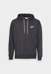Mörkgrå Nike-hoodie i mjukt tyg med en framficka, som har en liten reflektierande logotyp på bröstet och snörning i huvan.