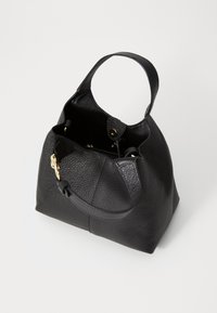 Black leather handbag with a textured surface, top handle, and an open top showcasing a spacious interior with gold hardware accents.