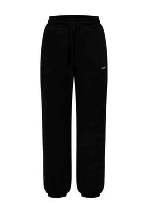 Pantalones de chándal negros con cintura elástica, cordón, bolsillos laterales y puños elásticos, que presentan un pequeño logo en el muslo derecho.