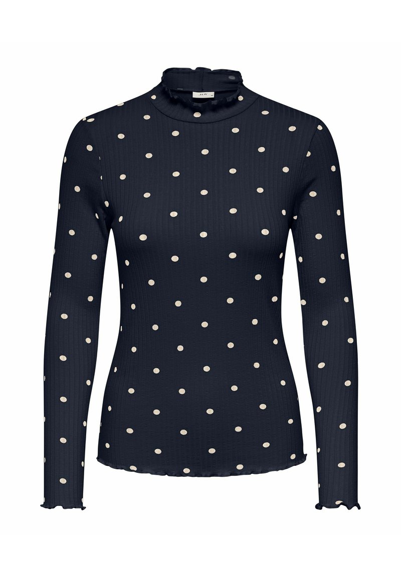 Granatowy top z długim rękawem i wysokim falbankowym kołnierzem. Posiada białe groszki, żebrowaną fakturę oraz faliste krawędzie na rękawach.