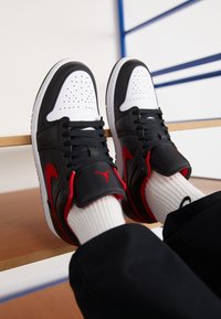 half red black and white jordan 1