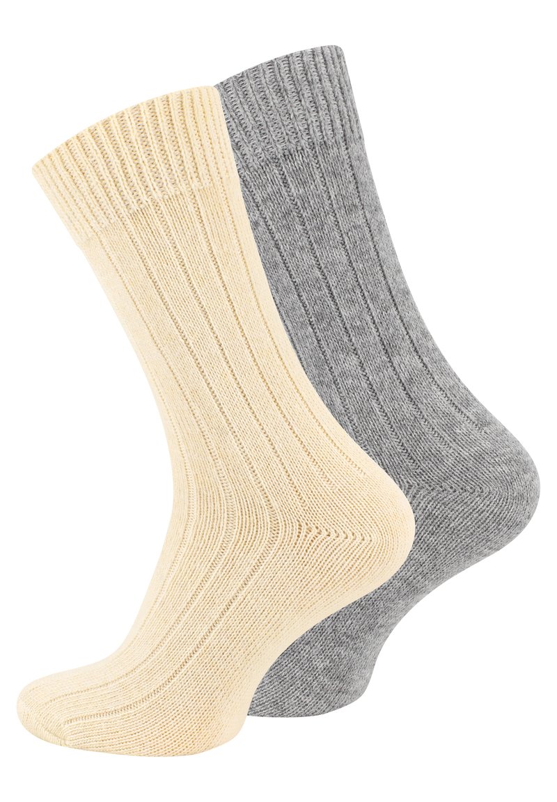 Calze a costine in tonalità beige e grigio. Materiale in misto cotone, lunghezza a metà polpaccio, con una morbida texture e sezioni rinforzate nella punta e nel tallone.