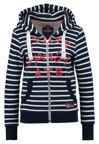Sudadera con cremallera a rayas en azul marino y blanco, con capucha ajustable, bolsillos frontales y bordado en rojo. Tejido de mezcla de algodón, diseño de corte casual.