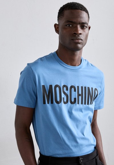 MOSCHINO Marškinėliai su spaudiniu - fantasia azzurro