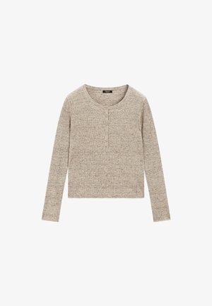 Beżowa bluzka typu henley z długim rękawem, o prążkowanej fakturze, okrągłym dekolcie i trzema guzikami z przodu. Casualowy, dopasowany fason.