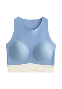 Light blue sports bra with molded cups, seamless design, and a white crossed band at the hem. Smooth texture and modern shape.