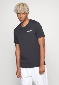 Levi's® GRAPHIC CREWNECK TEE - Marškinėliai su spaudiniu - caviar