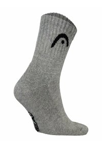 Calcetines grises con textura acanalada, que presentan un logo negro en el lateral. Diseñados para la comodidad con un talón y punta reforzados.