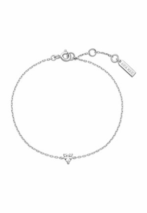 Braccialetto a catena sottile in argento con centro a forma di cuore in gemma trasparente e chiusura regolabile con piccolo tag rettangolare "ANIA HAE".