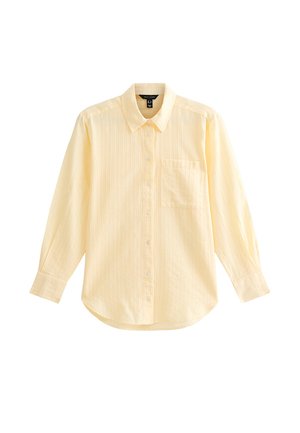 Lichtgele blouse met lange mouwen, subtiele verticale strepen en een borstzak, weergegeven op een witte achtergrond.