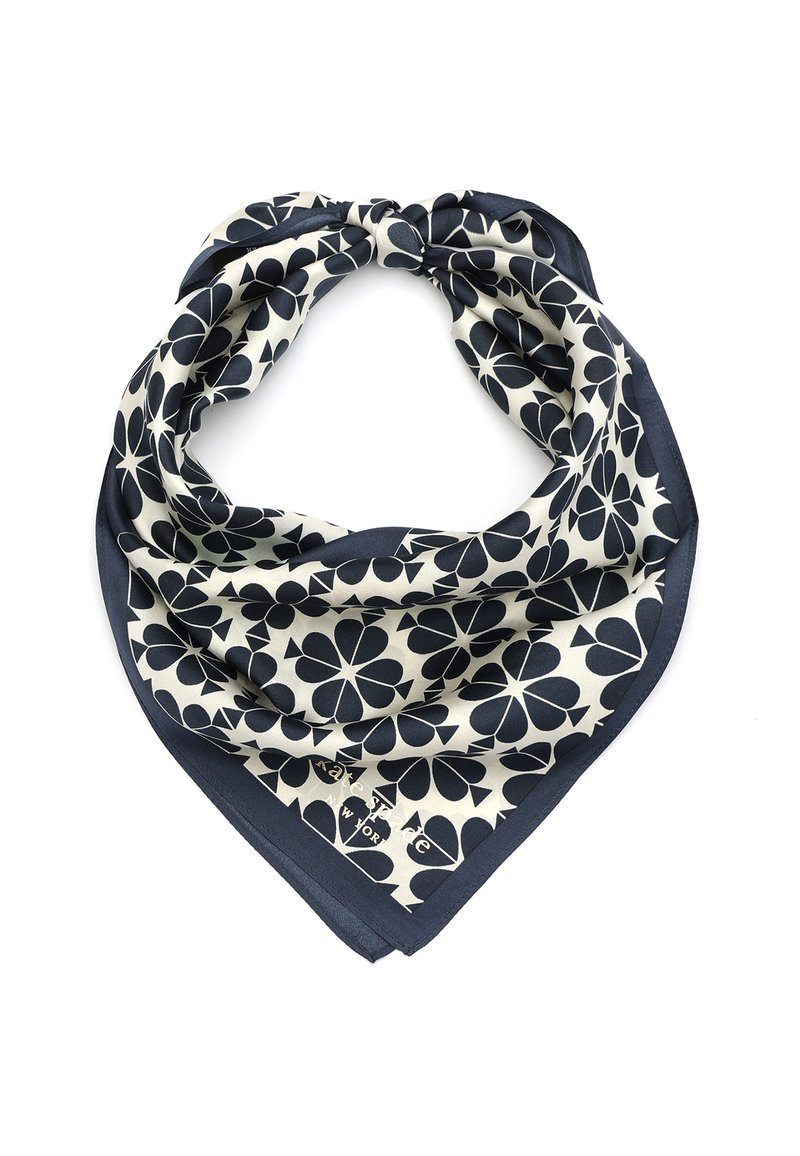 Square silk scarf in cream with navy floral pattern, finished with a solid navy border and a branded accent in gold at the edge.