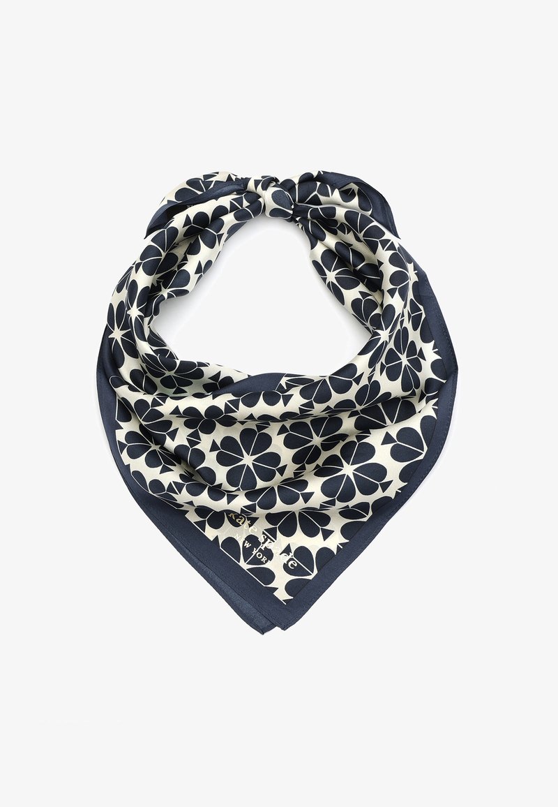 Square silk scarf in cream with navy floral pattern, finished with a solid navy border and a branded accent in gold at the edge.