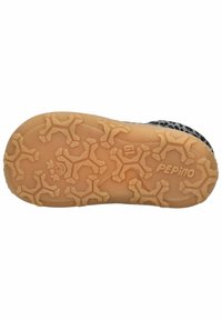 Semelle de chaussure noire avec un profil de semelle présentant des formes de chien répétées. Le caoutchouc est beige avec une finition texturée et le logo "Pepino" visible.