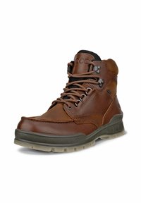 Brune lædervandreboots med sorte detaljer, snørebåndsdesign, polstret krave og en robust gummisål med mønstret sål for bedre greb.