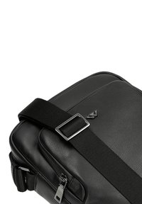 Wojas Umhängetasche - czarny